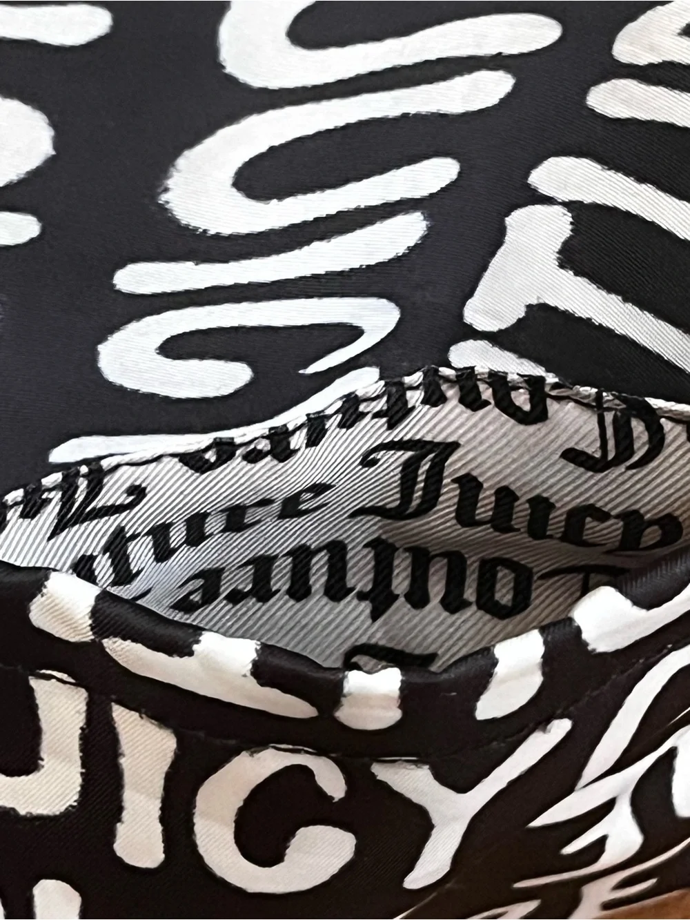 Juicy Couture 15”l 13”w